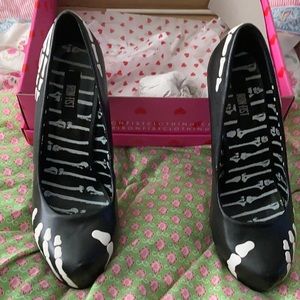 Iron fist platform skeleton heels